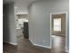 Inviting hallway leading to a kitchen and another room, showcasing the open floor plan at 3342 York Hwy, Gastonia, NC 28052