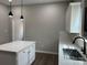 Recently renovated kitchen with white cabinetry, quartz countertops, stainless appliances, and modern fixtures at 3342 York Hwy, Gastonia, NC 28052
