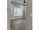 Open living room boasts natural light and new flooring at 3342 York Hwy, Gastonia, NC 28052
