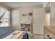 This bedroom has natural lighting, 2 doors, and a stylish book shelf at 4107 Balsam St, Indian Trail, NC 28079