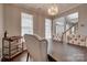 Dining room with hardwood floors, stylish chairs, and light fixture at 4107 Balsam St, Indian Trail, NC 28079