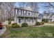 Attractive two-story home with a welcoming front porch and vibrant green lawn at 4107 Balsam St, Indian Trail, NC 28079