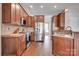 Kitchen featuring granite countertops, stainless steel appliances, and wood cabinets at 4107 Balsam St, Indian Trail, NC 28079