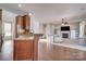 Open concept kitchen area flows into a living room and breakfast nook at 4107 Balsam St, Indian Trail, NC 28079