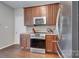 Kitchen with stainless appliances, granite countertops, and tile backsplash at 4107 Balsam St, Indian Trail, NC 28079