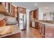 Kitchen featuring stainless steel appliances, granite counters, and wood cabinets at 4107 Balsam St, Indian Trail, NC 28079