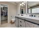 Bathroom with double sink vanity, walk-in closet and tile floors at 4107 Balsam St, Indian Trail, NC 28079