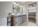 Bathroom featuring a double vanity with attractive mirrors and lighting at 4107 Balsam St, Indian Trail, NC 28079
