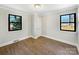 Bedroom with natural light, neutral tones and sleek wood look floors at 414 N Wylie St, Lancaster, SC 29720