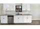 Kitchen featuring white cabinets, stainless steel appliances and granite countertops at 414 N Wylie St, Lancaster, SC 29720