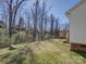 Spacious backyard with a wooden deck and mature trees at 439 Berwick Dr, Rock Hill, SC 29730