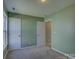 Bedroom featuring neutral carpet, and two white doors at 439 Berwick Dr, Rock Hill, SC 29730
