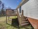 Home exterior featuring a wood deck with stairs and white siding at 439 Berwick Dr, Rock Hill, SC 29730