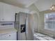 Bright kitchen featuring stainless steel refrigerator and a view to the breakfast nook at 439 Berwick Dr, Rock Hill, SC 29730