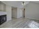 Bright living room featuring vaulted ceilings, fireplace, modern flooring and an open floor plan at 439 Berwick Dr, Rock Hill, SC 29730