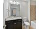Bathroom with a single vanity and granite counters, toilet and tile in the tub/shower combo at 4624 Pebble Run Dr, Matthews, NC 28105