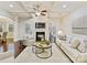 Inviting living room with coffered ceiling, fireplace, and hardwood floors at 4624 Pebble Run Dr, Matthews, NC 28105