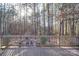Deck view showing patio and outdoor fireplace at 4763 River Hills Dr, Denver, NC 28037