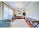 Bright and airy dining room with neutral walls, hardwood floors, and large windows at 4763 River Hills Dr, Denver, NC 28037