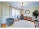 Charming dining room with neutral walls, hardwood floors, and a large window at 4763 River Hills Dr, Denver, NC 28037