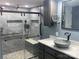 Renovated bathroom featuring a walk-in shower, sleek vanity, and modern fixtures at 485 Harper Miller Dr, Cleveland, NC 27013