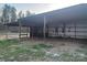 An outbuilding with a metal roof and open sides at 485 Harper Miller Dr, Cleveland, NC 27013