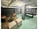 Finished basement showcasing a seating area, with plenty of space for recreation at 5057 Murrayhill Rd, Charlotte, NC 28210