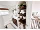 Bathroom with single sink vanity, decorative shelves, and modern fixtures at 5057 Murrayhill Rd, Charlotte, NC 28210