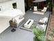 Inviting backyard patio with outdoor seating, a fire pit, and lush greenery at 5057 Murrayhill Rd, Charlotte, NC 28210