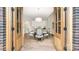 Dining room with hardwood floors, stylish chairs, and an open concept design at 518 Streamside Ln, Marvin, NC 28173
