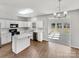 Well-appointed kitchen flowing into the dining area with abundant natural light at 5810 Dove Point Sw Dr, Concord, NC 28025