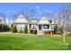 Charming single-Gathering home with well-maintained landscaping, covered porch, and inviting curb appeal at 6016 Dogwood Blvd, Kannapolis, NC 28081