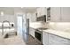 Well-lit kitchen with stainless steel appliances, granite countertops, and stylish cabinetry at 6016 Dogwood Blvd, Kannapolis, NC 28081