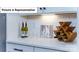 Stylish counter with wine storage, decorative artwork, and accent lighting at 7021 Sylvan Retreat Dr, Denver, NC 28037