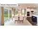 Elegant dining room with natural light, hardwood flooring, and a view of the outdoor living at 7021 Sylvan Retreat Dr, Denver, NC 28037