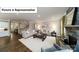 Spacious living room with hardwood floors, fireplace, and an open layout at 7021 Sylvan Retreat Dr, Denver, NC 28037