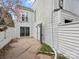 View of back yard with door and horizontal siding on home at 7415 Mystic Ln, Charlotte, NC 28227