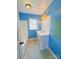 Bathroom featuring a vanity sink, tub, and blue painted walls at 826 E Alexander St, Lincolnton, NC 28092