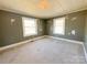 Bedroom featuring carpeted flooring and natural light at 826 E Alexander St, Lincolnton, NC 28092