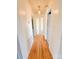 Hallway with wood flooring and white walls at 826 E Alexander St, Lincolnton, NC 28092