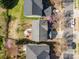 Overhead aerial of the property, highlighting its roof, backyard layout, and proximity to nearby streets at 9018 Seamill Rd, Charlotte, NC 28278