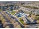 This aerial shot showcases the community pool, recreational areas, and surrounding houses, offering a sense of community at 9018 Seamill Rd, Charlotte, NC 28278