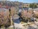 Expansive aerial view of a landscaped home with a long driveway and mature trees at 9018 Seamill Rd, Charlotte, NC 28278