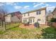 Well-maintained backyard featuring a patio area and a lush lawn, perfect for outdoor entertaining at 9018 Seamill Rd, Charlotte, NC 28278