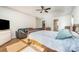 Bright primary bedroom featuring wood floors and a lounge area and walk-in closet at 9018 Seamill Rd, Charlotte, NC 28278