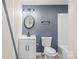 This bathroom features modern vanity, framed mirror, toilet, tub-shower with updated fixtures at 98 Ring Sw Ave, Concord, NC 28025