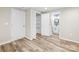 The view from this bedroom overlooks to an adjoined bathroom and walk-in closet with built-in shelves at 98 Ring Sw Ave, Concord, NC 28025