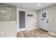 A cozy entryway featuring a glass door with views of the outdoors and light-colored flooring at 98 Ring Sw Ave, Concord, NC 28025
