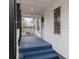 Cozy covered front porch with painted floors and a welcoming view to the neighborhood at 98 Ring Sw Ave, Concord, NC 28025