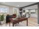 Cozy home office connected to updated kitchen with a large desk and natural light at 98 Ring Sw Ave, Concord, NC 28025